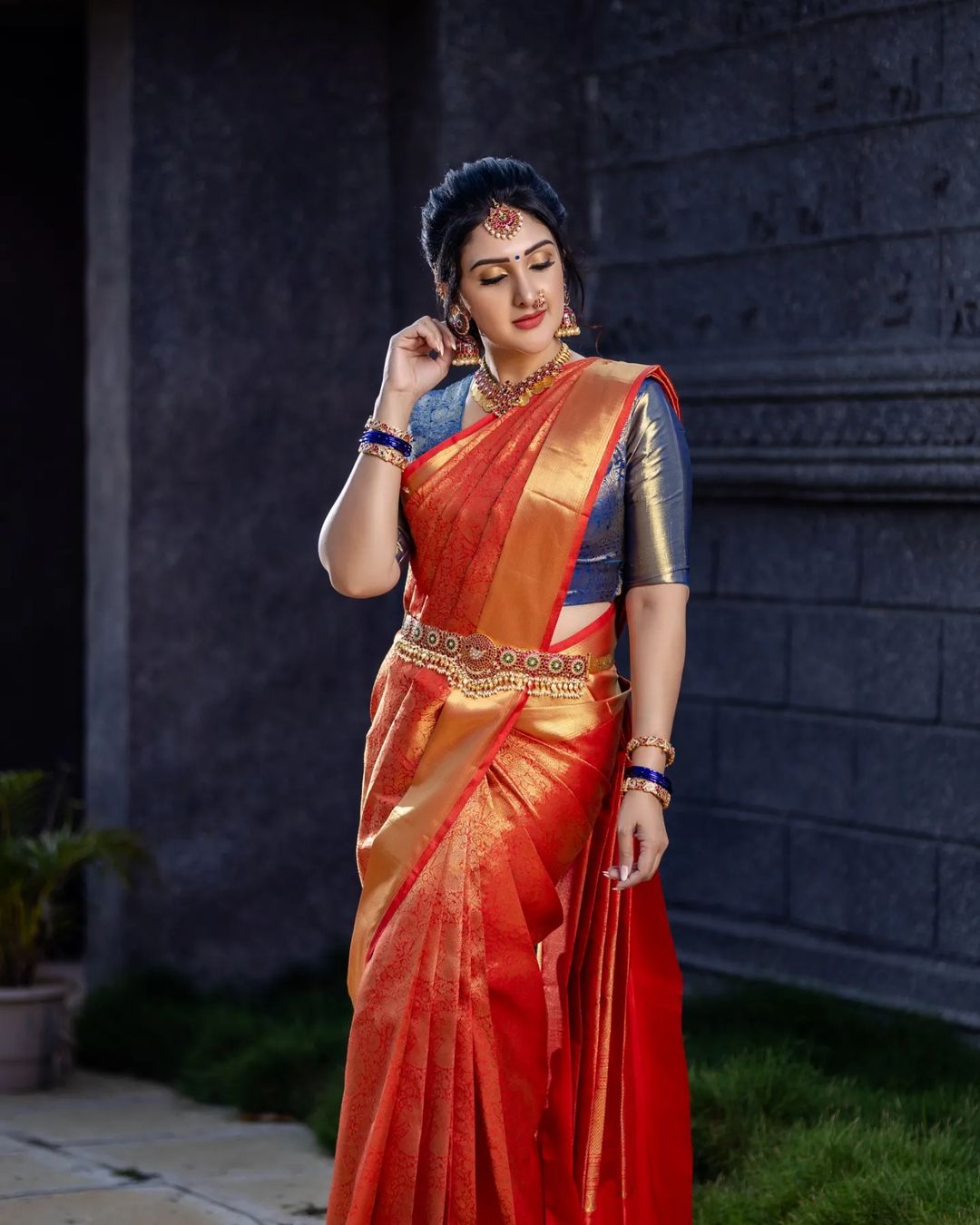 Telugu TV Actress Sridevi Vijaykumar Images in Orange Saree Blue Blouse 3